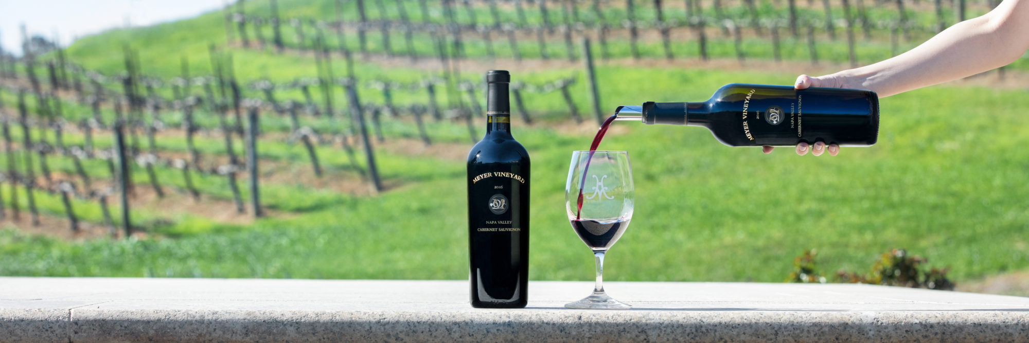 A pour of the 2016 Meyer Vineyard Cabernet Sauvignon in the vineyard.